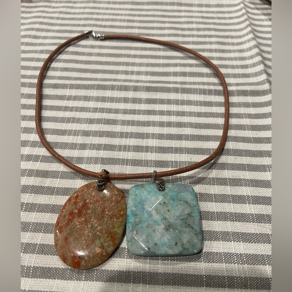 2 different Natural stone pendants 1 leather cord necklace (s)